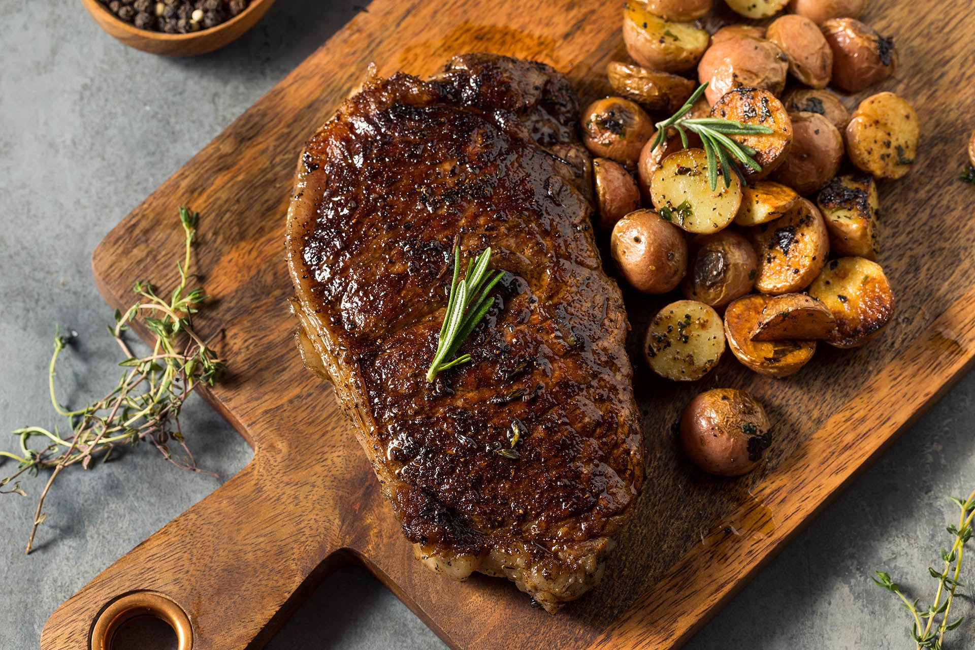 American Wagyu New York Strip Steak on a cutting board